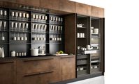 Dust oak | Copper oxidized liquid metal | Worktop: Kerlite and Fenix laminate | Groove and plinth: Urban