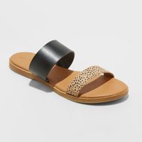 From Saturday errands to Sunday brunch, keep your look casual and charming with the Torri Two-Band Sandals from Universal Thread™. These double-band slide sandals feature a wide faux-leather band closer to the ankle and a slimmer one toward the toes, complete with accent details for a standout finishing touch. Pair with skinny jeans and a scoop-neck tee or a breezy maxi dress and denim jacket to meet up with friends. Size: 6.5. Color: Black. Gender: female. Age Group: adult. Pattern: Solid. Mate