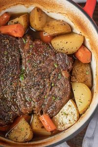Classic Pot Roast is comfort food at it's best, made with potatoes and carrots, slow roasted in the oven is the perfect weekend dinner ready in 3 hours. #potroast #slowcooker #instantpot #chuckroast #beef #dinner #roast #crockpot #dinnerthendessert