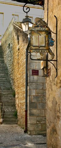 France Travel Inspiration - St Emilion book sign. Antique bookstore sign in St. Emilion. Not just wine in St. Emilion but a good book and a glass of wine is a good combination.