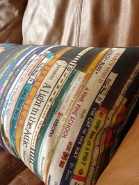 Reading Pillow ~ Take a picture of a shelf full of books (rearrange to your liking) then upload to Spoonflower.com to make fabric.
