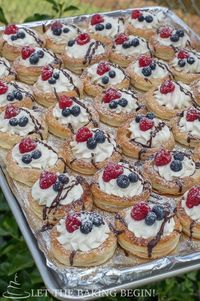 Puff Pastry Berries & Cream Tarts is a delicious Fruit Tart recipe. These puff pastry tarts are made with frozen Puff Pastry, filled with Sweetened Cream, then topped with berries and a drizzle of chocolate ganache. No one will believe that these are homemade tarts and not bought at a fancy bakery!