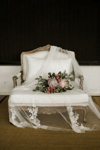 Eucalyptus & blush pink protea set the tone of this dreamy bouquet