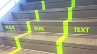 Sign of the Times: "Texting lane" on university stairway gets huge response | Signage & Wayfinding content from American School & University