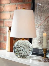 The Briggs Table Lamp adds a touch of sophistication with its organic bubble-like shape, clear crystal body and natural linen shade. The natural brass neck and ball finial complete the piece adding modern, minimalist detailing. *Shipping times may vary.*Backorder dates are subject to change.