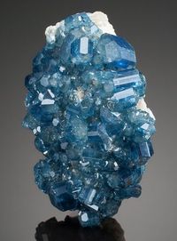 APATITE Alto Da Cabeca Mine, Parelhas, Rio Grande do Norte, Brazil. Interlocking crystals in Apatite is considerably less common than all the other varieties. Good looking Apatite of blue coloration is even rarer. Heritage Auctions, June 2013.