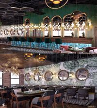 The lightings upper the bar and the blue covering give the place a dynamic. Also, green leaf patterned tiles and mirrors on the wall transform the rustic style into elegance. | Barın üstündeki aydınlatmalar ve mavi kaplama mekana dinamiklik katıyor. Ayrıca duvardaki yeşil yaprak desenli karolar ve aynalar rustik tarzı şıklığa dönüştürüyor. #cafedecoration #cafedesign #restaurantdesign #restorantasarımı #cafetasarımı #cafedekorasyonu #içmimari #bartasarımı #bardesign #lighting #walldecoration