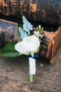 Blue Boutonniere photo by http://www.loragradyphotography.com/