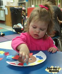 Colorful tissue paper turkey craft for Thanksgiving, easy children's activity