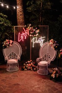A fab little #photocall corner for a party loving bride with a #letsparty #neonsign #licandroweddings | #weddingplanner