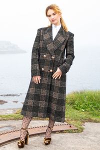 Lily James styled patterned tights in the chicest way - HarpersBAZAARUK