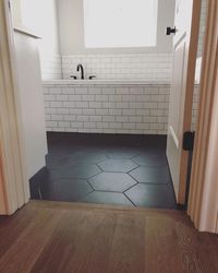 Tile... + love the way tile meets the hardwood..