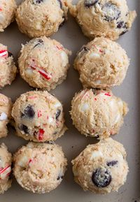 Soft and chewy, just like a chocolate chip cookie should be--these Peppermint Chip Cookies are your new favorite Christmas Cookie! Take these to the cookie exchange--or save them for yourself--loaded with candy canes and lots of chips, they will make Santa extra happy! #cookies #christmascookies #holidayrecipe #baking #candycane #candycanecookies #peppermint