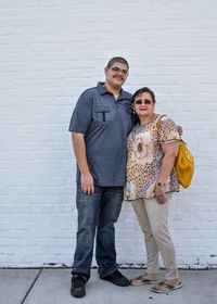 Mom and adult son pose. Can you feel the love?