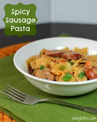 Spicy Sausage Pasta - warm, spicy, creamy, cheesy and full of smoky sausage, creamy sauce, spicy tomatoes and chiles and hearty pasta. Only 366 calories or 10 Weight Watchers SmartPoints per serving! www.emilybites.com