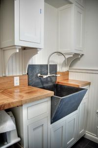 soapstone sink in a laundry room = love. by Gulf Shore Design
