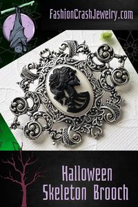 This Skeleton Brooch pin for Halloween or any occasion begins with a bold elegant silver framework. A black on white Skeleton lady Cameo sits into the framework. An overall feminine Gothic look presents with this piece