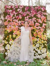 Floral Backdrop: Looking for something that will really pop at your wedding? Whether constructed out of fresh or paper flowers, it’ll definitely grab guests’ attention and create a beautiful photo setting.