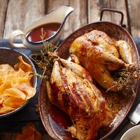 Roast pheasant with bread sauce, game chips and juniper gravy