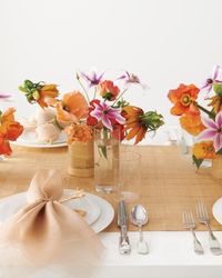 Raffia Mat Runner: We reimagined inexpensive and portable everyday products to make gorgeous dinner settings. A straw mat, like this one from JamaliGarden.com, is a natural choice for outdoor and indoor celebrations alike.
