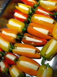 mini cheese stuffed peppers - just slice open peppers, add string cheese, and broil in oven for about 10 minutes.