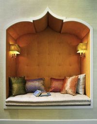 A built-in reading nook with Moroccan flair.