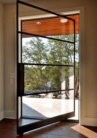 Thinking a pivot door for front door. Dont like this particular one.