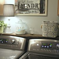 Most dryers can't be pushed up against the wall due to the dryer vent so why not build a shelf to cover the gap. Not only does it add more storage but it also keeps items from falling behind the washer and dryer
