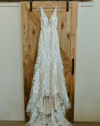 Sexy Floral Lace A-line Wedding Dress Greenley by Maggie Sottero. Click to find this gown! . . . . #sexyweddingdress #floralweddingdress #laceweddingdress #alineweddingdress #tulleweddingdress #vneckweddingdress