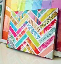 Small art project - strips of magazines glued to a canvas