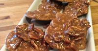 PRALINES 1 ½ cups sugar ¾ cup dark brown sugar ½ cup whole milk 1 teaspoon vanilla extract 6 tablespoons...
