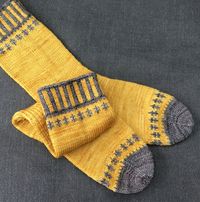 (Photos: Deborah Kemball) These gorgeous socks were just published to Ravelry this week and are designed by one of our very own customers! Self-Important Socks by the lovely Deborah Kemball are kni…
