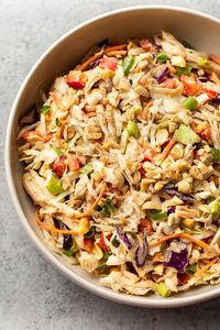 This Thai chicken salad recipe is quick and easy and has a delicious peanut dressing! Better than Panera's!