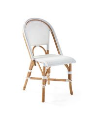 The classic Parisian bistro chair, reinvented. True to its roots, each rattan frame is crafted in a time-honored technique perfected by the French, bent and shaped by hand until the iconic shape is achieved. The seats are woven from the finest quality rattan and lightweight resin, making them fabulously family-friendly and great for dining spaces.