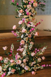Gorgeous, lush floral columns in shades of pink and neutral for a New Orleans garden style wedding ceremony at Hotel Peter + Paul by Leaf + Petal NOLA