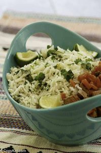 Make Chipotle's Cilantro Lime Rice instead of the usual Mexican rice for a tasty side dish. It's super easy with this 5 ingredient copycat recipe and video. Enjoy this healthy side dish with burritos, enchiladas, and fajitas. #ricerecipes #mexicanfood #mexicanrecipes #cilantro #cilantrolimerice #sidedishrecipes #copycat #copycatrecipes