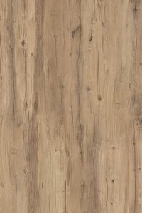 Baldosa porcelánica de ABK Stone con efecto imitación madera realizado con minucioso detalle para recrear las grietas e imperfecciones del material original con un realismo sorprendente.