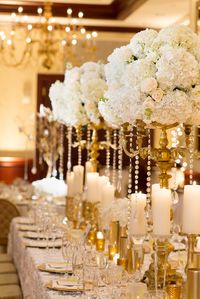 Gold Candelabra Centerpiece With White Roses More