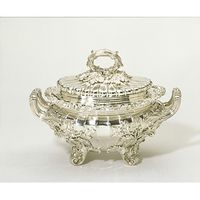 Great Britain, UK 1819-1820 Storr, Paul, Edward Hodges Baily; Silver Containers for sauce such as this were, like the sauce they held, a French innovation. A typical dinner service might have four sauce tureens, although as many as ten might be required for the largest and grandest dinners. The ornate Rococo style of this tureen, with exuberant naturalistic acorn, oak leaf and shell decoration, and scrolled feet, was advanced taste at the time.