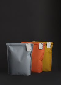 Simple pouch design . multicolor. thick card stock/ fabric creates high end feel