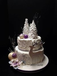 Winter Wonderland theme for a bridal shower. Used many elements on this cake including Isomalt and chocolate for the ornaments.