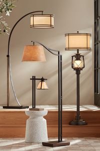 Bronze beauties 🌟 Shop floor lamps and desk lamps in a variety of styles from industrial to mid-century modern, contemporary to traditional, farmhouse to rustic, and more for living room, bedroom, dining room, and home office. Gentry Oil-Rubbed Bronze 2-Light Downbridge Arc Floor Lamp- Style 78Y02 Tahoe Bronze Downbridge Arc Floor Lamp- Style 79Y13 Maricopa Bronze Column Desk Lamp with USB Port and Outlet- Style 74V11 Henson Bronze Finish Rustic Lantern Floor Lamp with Night Light- Style 64M56