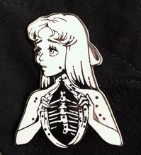 2 inch black nickel hard enamel pin.