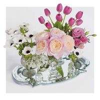 Mixing bud vases is a clever way to add a vintage look to your wedding centerpieces. We love this look of ‘gathered bunches’ from @FloristsReview with monobotanical bud vase groupings of Anemones, tulips, Lisianthus, Queen Anne’s lace, and ‘Constance’ garden roses on an antique-look, mirrored tray.