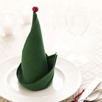 Folded Napkins that Look Like Elf Hats