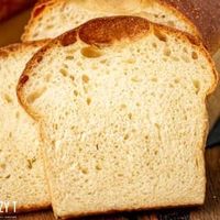 The best homemade bread! Soft, chewy sourdough bread with a beautiful golden brown crust. This easy homemade bread recipe makes two loaves and is the perfect white sandwich bread.