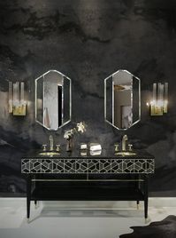 A sleek black console paired with silver trimmed mirrors oozes sophistication. Image courtesy, Maison Valentina
