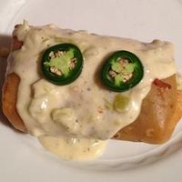 Chicken Chimichangas with Sour Cream Sauce - Allrecipes.com