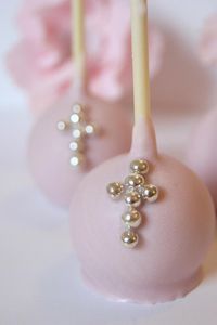 Beautiful Pink Baptism Cake Pops by "Evie and Mallow" cute but when you eat it its an upside down cross...