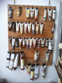 Hang up paint tubes using binder clips. | 45 Organization Hacks To Transform Your Craft Room ( I NEED A CRAFT ROOM)